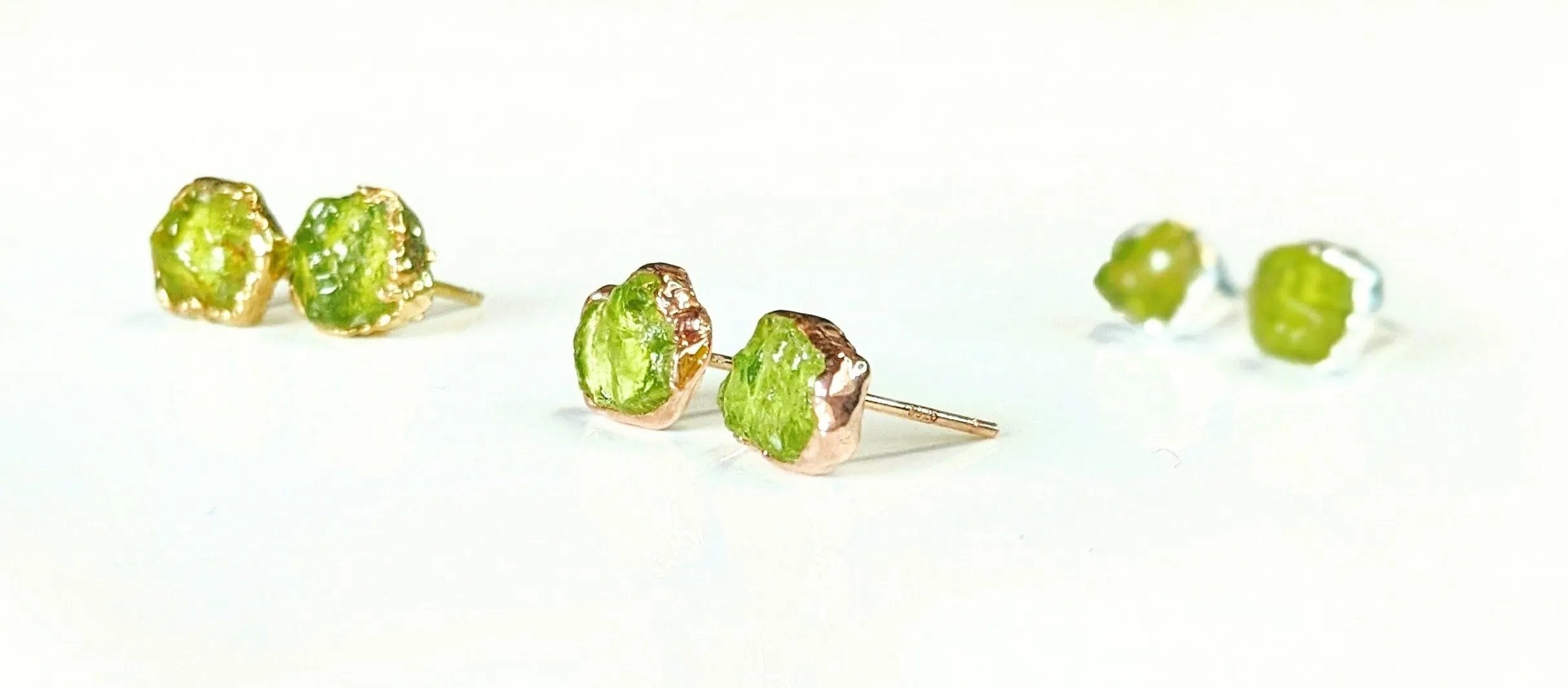 Raw Peridot stud earrings