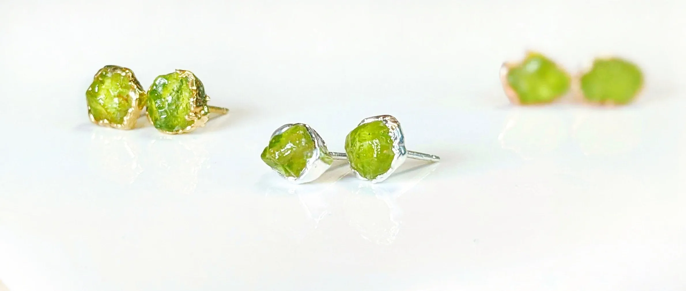 Raw Peridot stud earrings