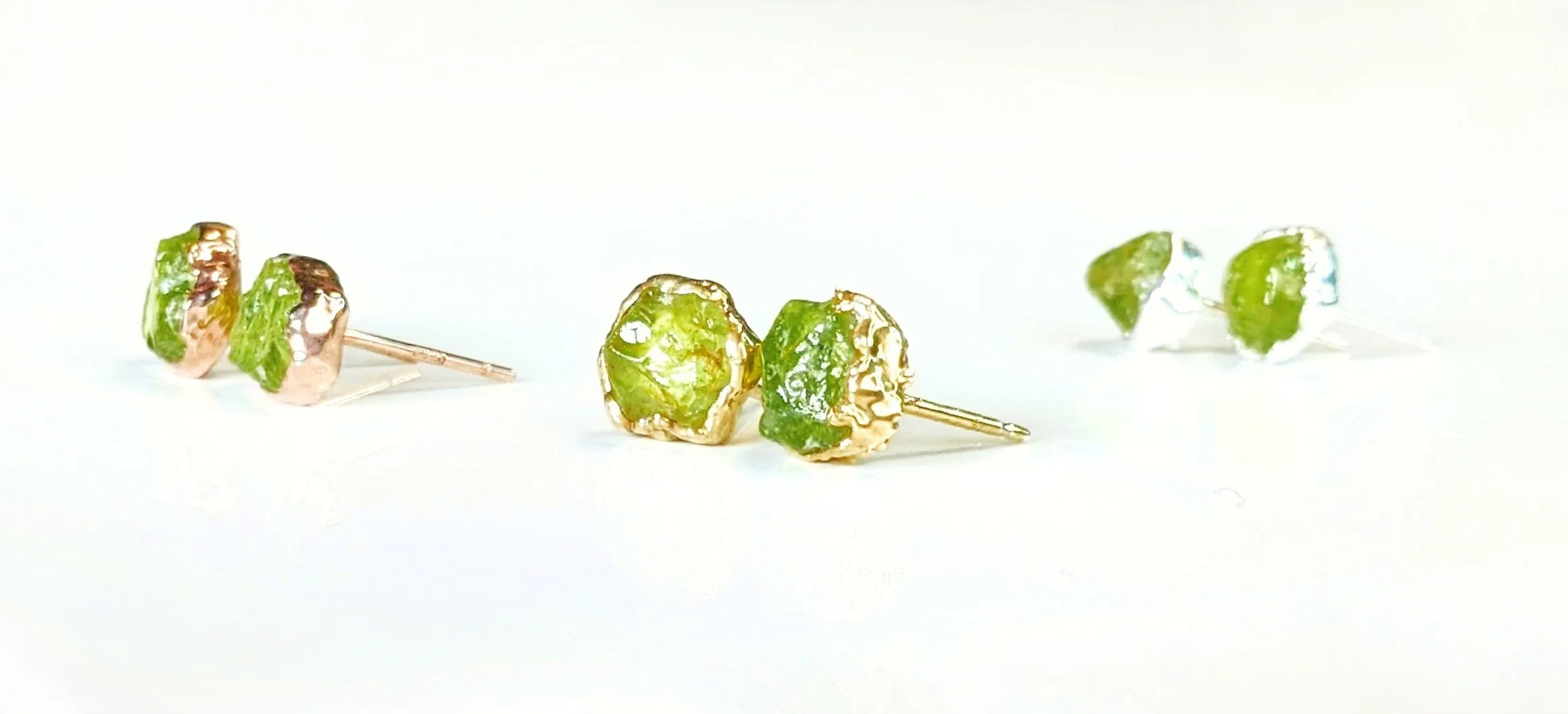 Raw Peridot stud earrings