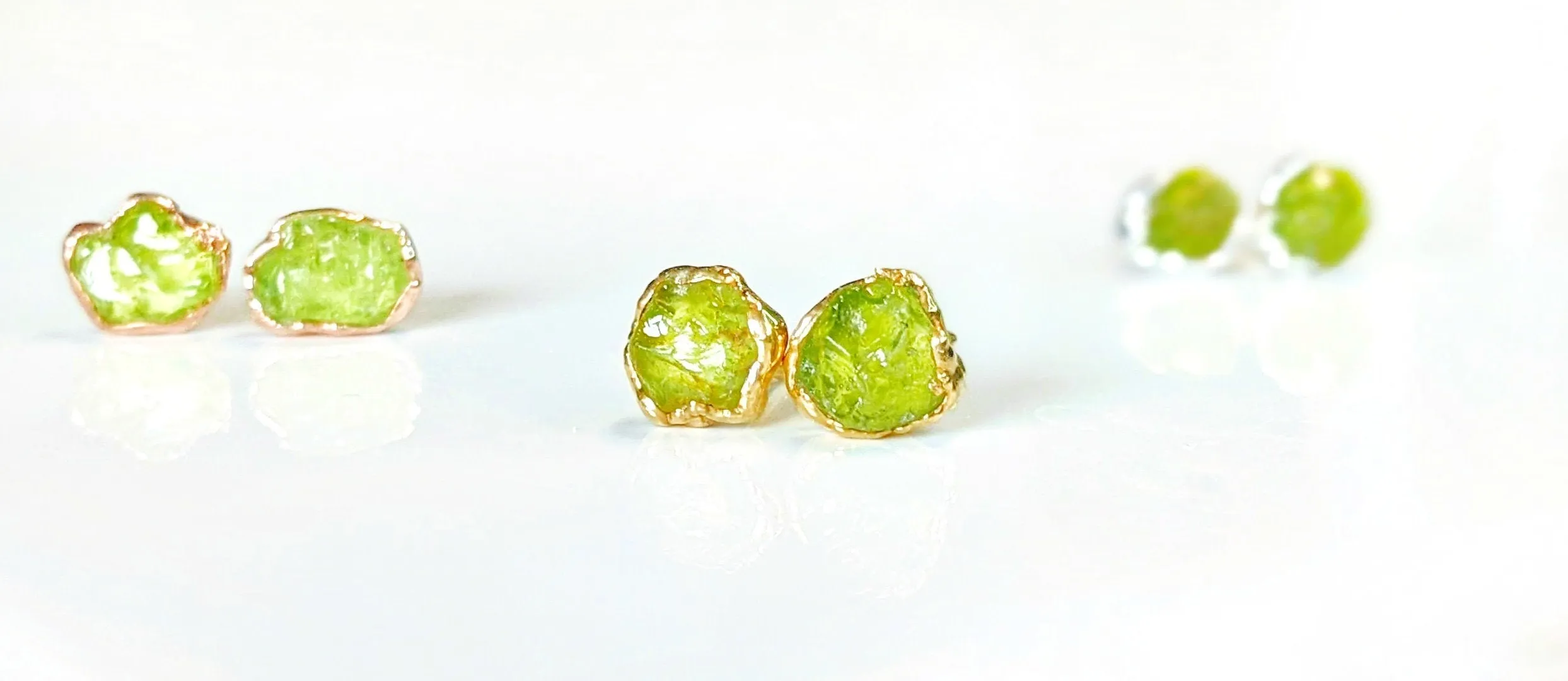 Raw Peridot stud earrings