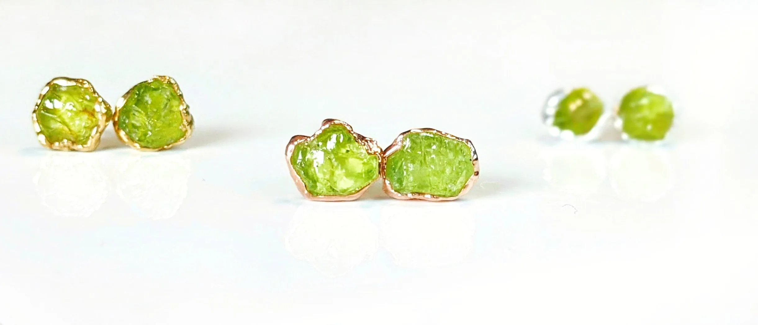 Raw Peridot stud earrings